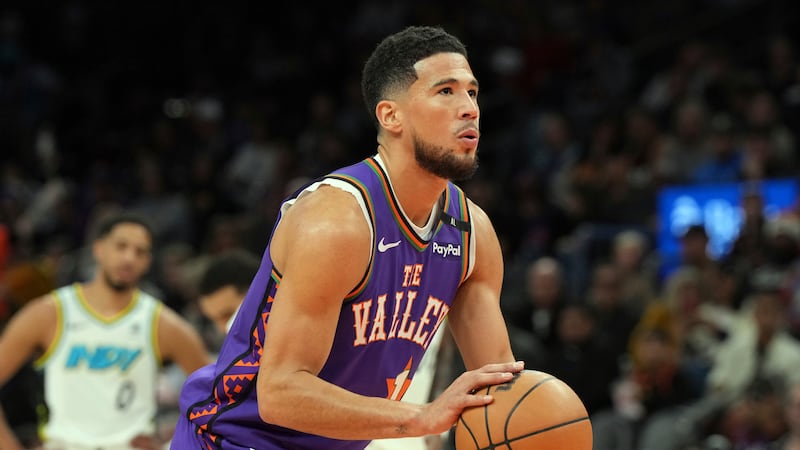 Phoenix Suns guard Devin Booker (1) during the first half of an NBA basketball game against...