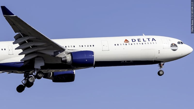 Airline officials are investigating how a woman, without a boarding pass, was able to get...