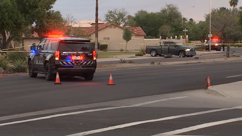 Police respond to a deadly two-vehicle crash happened at 91st Avenue and Hearn Road, just...