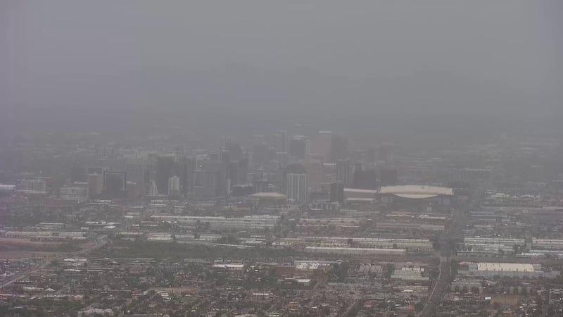 Hazy downtown Phoenix skyline as seen from atop of South Mountain park.
