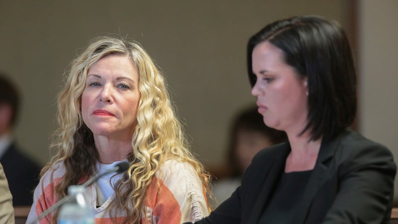 FILE - Lori Vallow Daybell glances at the camera during her hearing in Rexburg, Idaho., on...