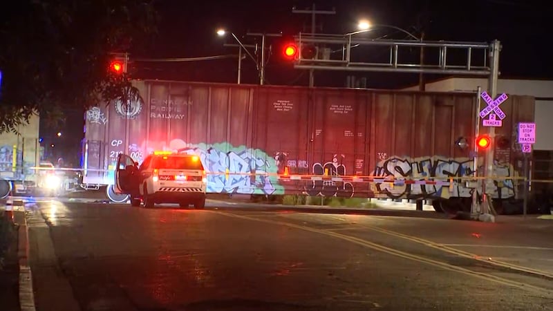 Police respond after a woman was hit by a train overnight at 1st Street and Jackson Avenue in...