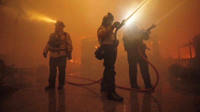 Fire crews battle the Eaton Fire Wednesday, Jan. 8, 2025 in Altadena, Calif.