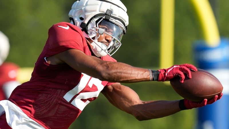 Arizona Cardinals wide receiver Zay Jones makes a catch during a joint NFL football practice...