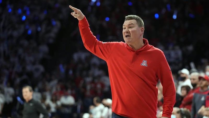 Arizona coach Tommy Lloyd reacts to a play during the second half of the team's NCAA college...