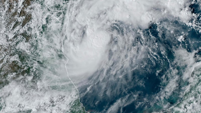 This GOES-16 GeoColor satellite image taken at 4:50 p.m. EDT and provided by National Oceanic...