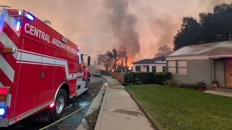 Firefighters from the Central Arizona Fire and Medical Authority are assisting California...