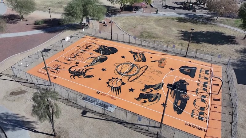 The court features icons that represent a part of Devin Booker's life.