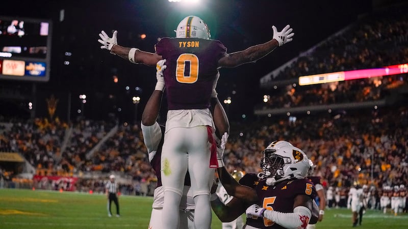 Arizona State wide receiver Jordyn Tyson (0) is lifted in the air after scoring a touchdown...