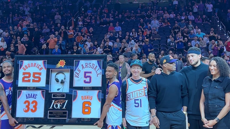 Suns honored Devin Booker at center court on Friday.