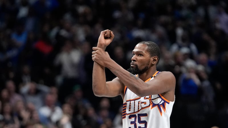 Phoenix Suns forward Kevin Durant gestures for a foul called in the final second of the second...