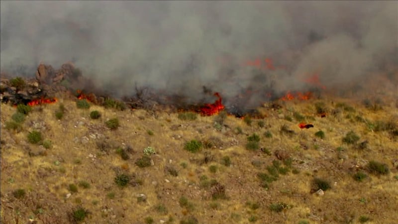 Smoke is visible in the Valley due to a wildfire burning northeast of Apache Junction in the...