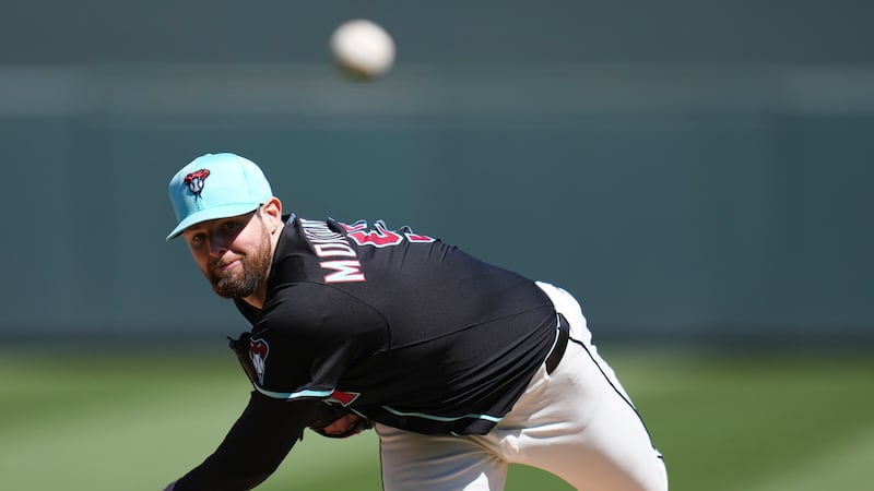Arizona Diamondbacks starting pitcher Jordan Montgomery warms up during the second inning of a...