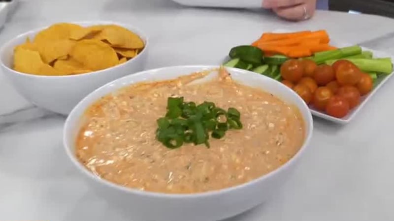 The cheesy buffalo chicken dip is one of the healthy recipes recommended for game-day food.