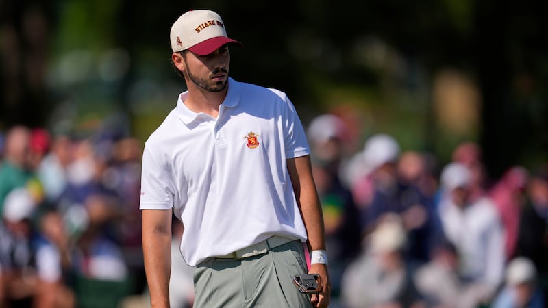 Jose Luis Ballester, of Spain, reacts after missing a putt on the second hole during the first...