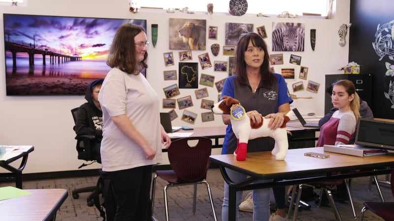 Student Peyton Boone (left) nominated Shari Charboneau for the Silver Apple Award.