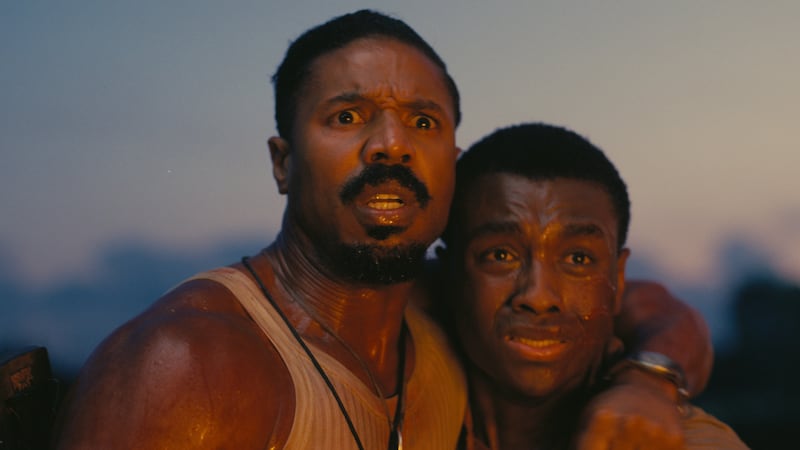 MICHAEL B. JORDAN as Smoke and MILES CATON as Sammie Moore in Warner Bros. Pictures’...