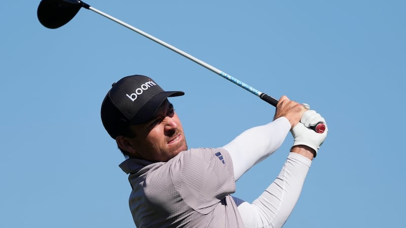 Nick Taylor, of Canada, hits a tee shot on the second hole during the final round of the...