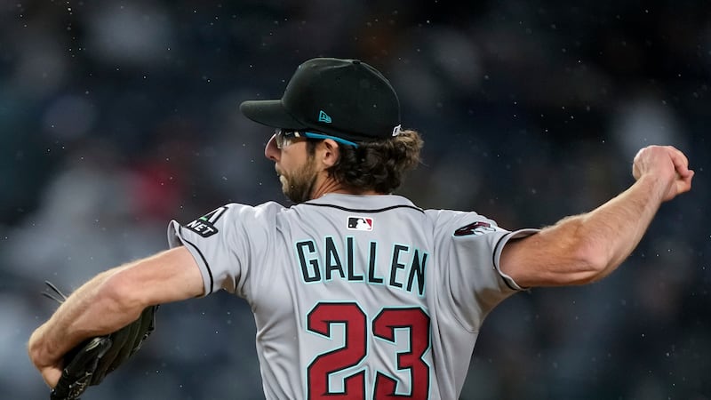 Arizona Diamondbacks pitcher Zac Gallen throws during the first inning of a baseball game...