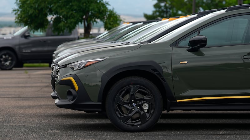 Unsold 2024 Crosstrek models sit on the lot of a Subaru dealership Tuesday, June 25, 2024, in...