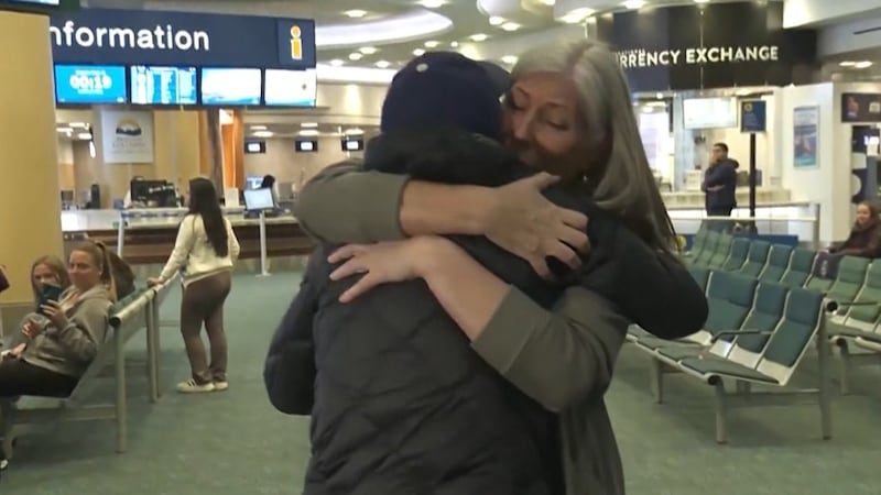 Jasmine Mooney hug her mother as she arrives back in Canada after a two-week detention in ICE...