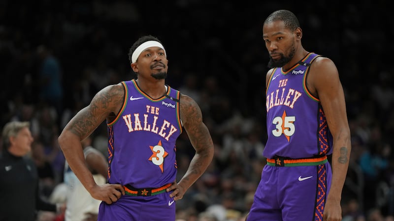 Phoenix Suns guard Bradley Beal (3) and forward Kevin Durant (35) during the first half of an...