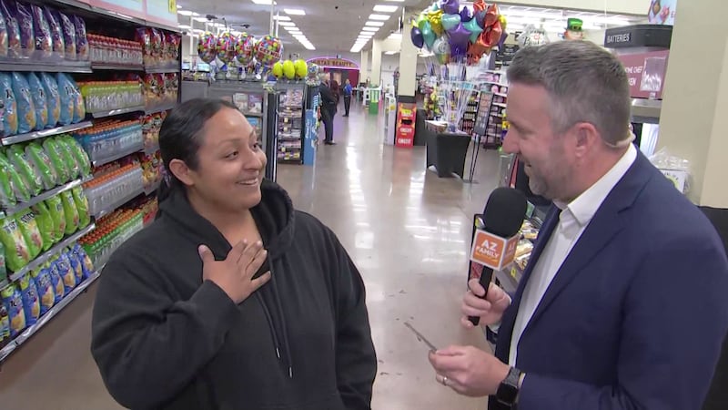 When Ian handed her one of the gift cards, she smiled and said it would certainly help cover...
