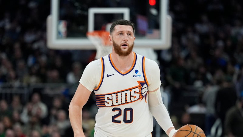 Phoenix Suns' Jusuf Nurkic during the first half of an NBA basketball game against the...