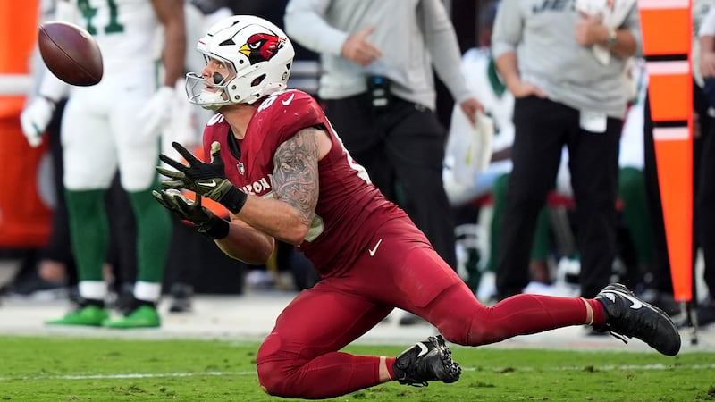 Arizona Cardinals tight end Trey McBride (85) pulls in a pass against the New York Jets during...