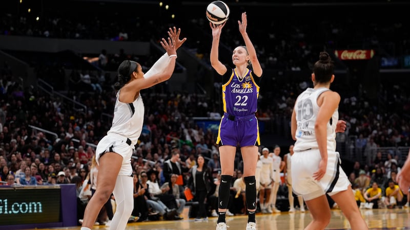 Los Angeles Sparks forward Cameron Brink (22) shoots against Las Vegas Aces center A'ja...